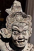 Bangkok Wat Arun - the gallery is lined all around with beautiful statues of chinese figures. 